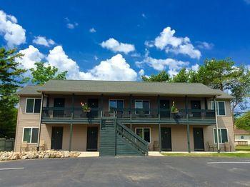 Lucky Horseshoe Cabins Hotel Au Sable Exterior photo