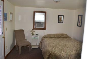 Lucky Horseshoe Cabins Hotel Au Sable Exterior photo